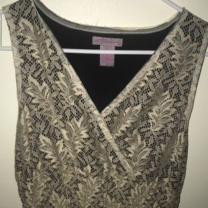 Tan dress with black underlay.